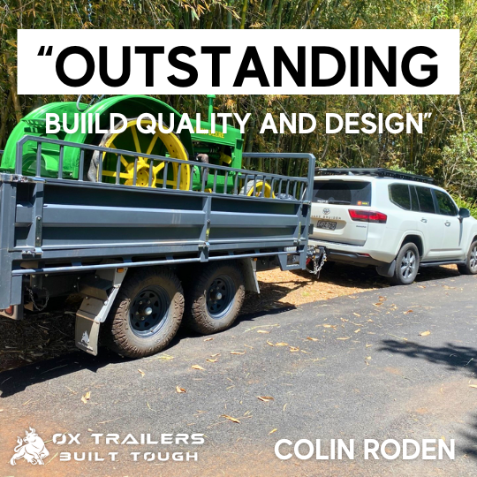 A 4.5t tipper trailer carrying a tractor, built tough by Ox Trailers and praised as outstanding by customer Colin Roden.