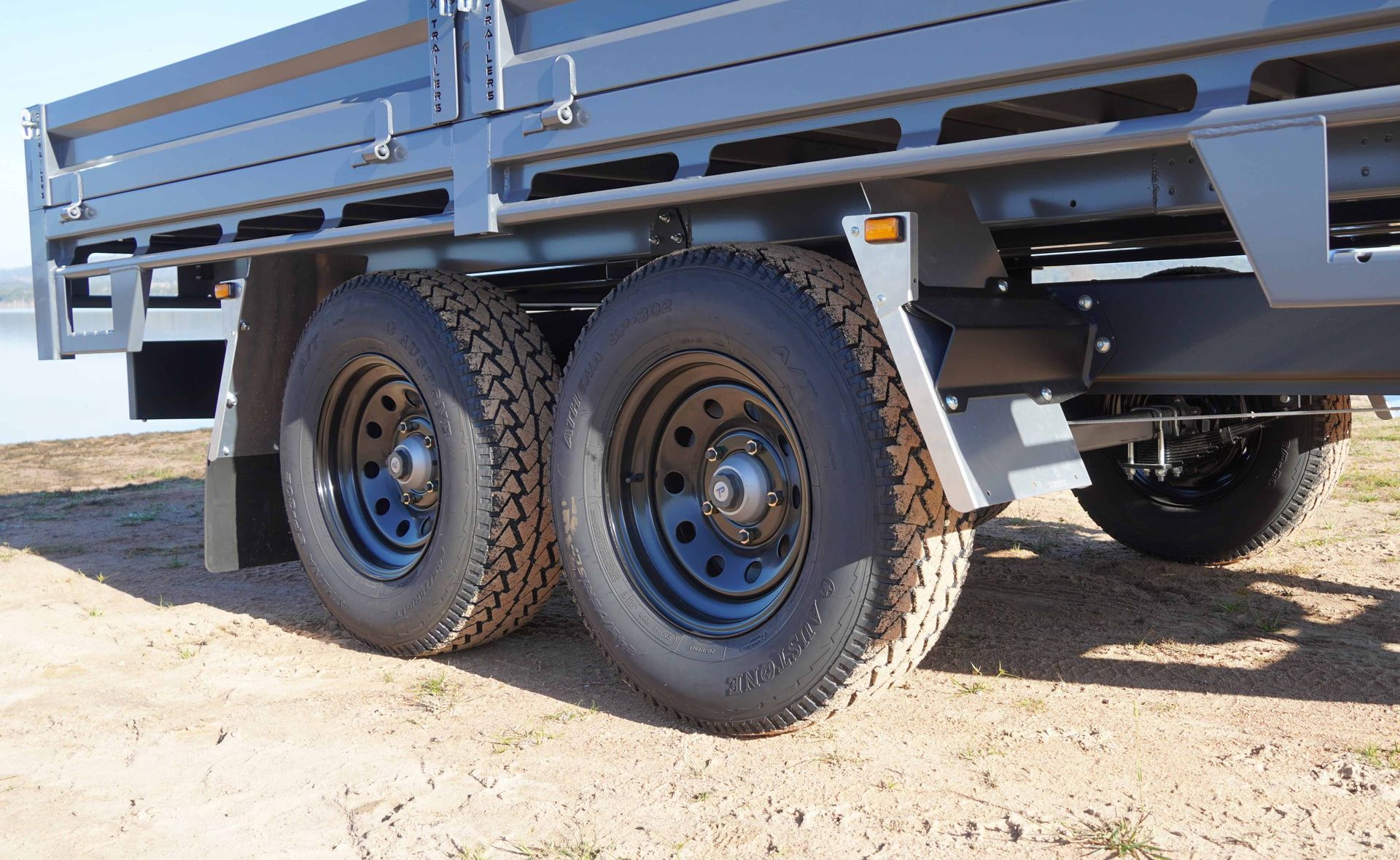 The 16-inch wheels of an ox trailer rear tipper trailer.