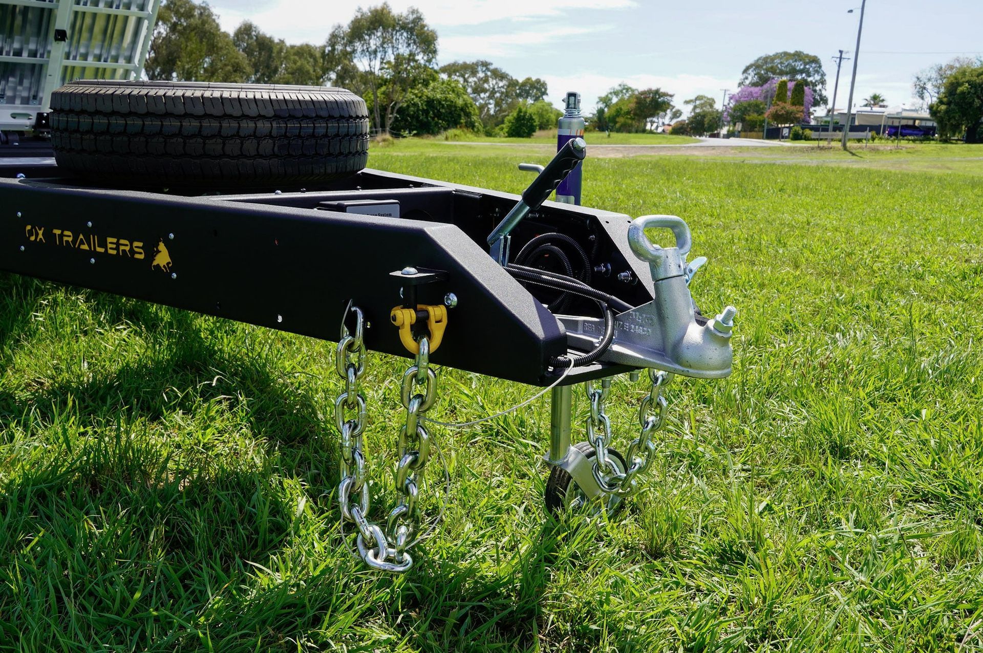 front of the trade series flat top trailer depicting the length of the drawbar.