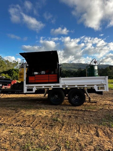 The Harlock Flat Top trailer  on site with toolboxes open.