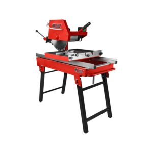 A red and black machine is sitting on a table.