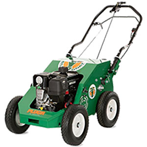 A green lawn mower is sitting on a white surface.