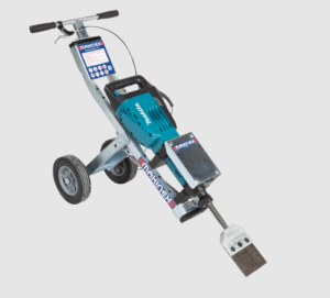 A machine that looks like a tricycle with a hammer attached to it