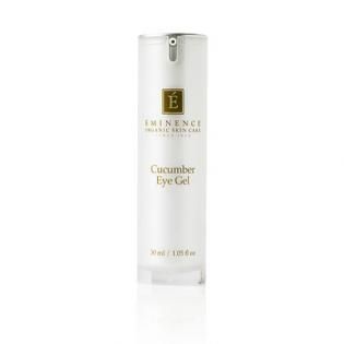 White Eminence cucumber eye gel bottle with gold label on a plain background