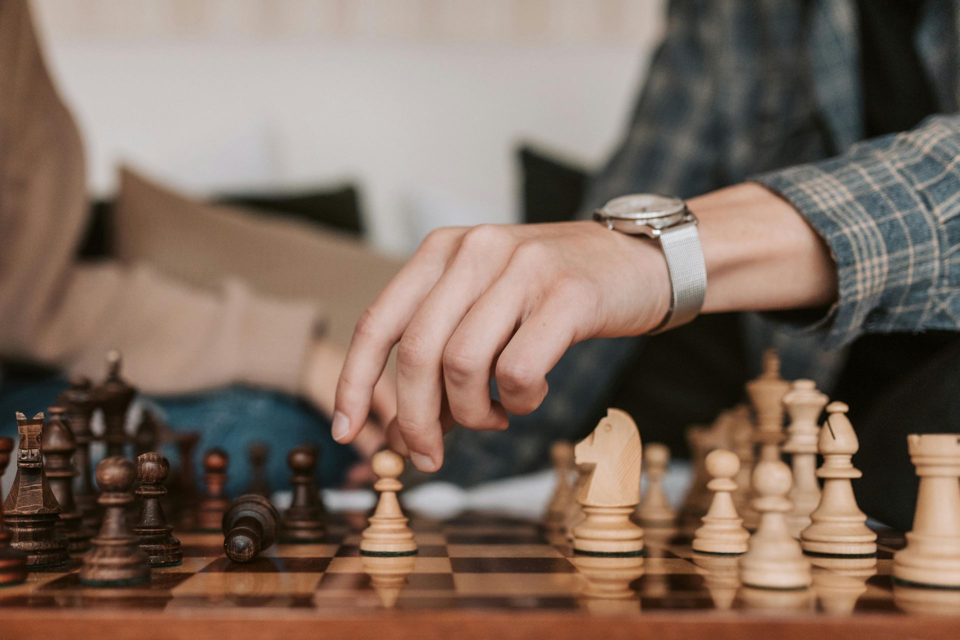 two players playing chess.