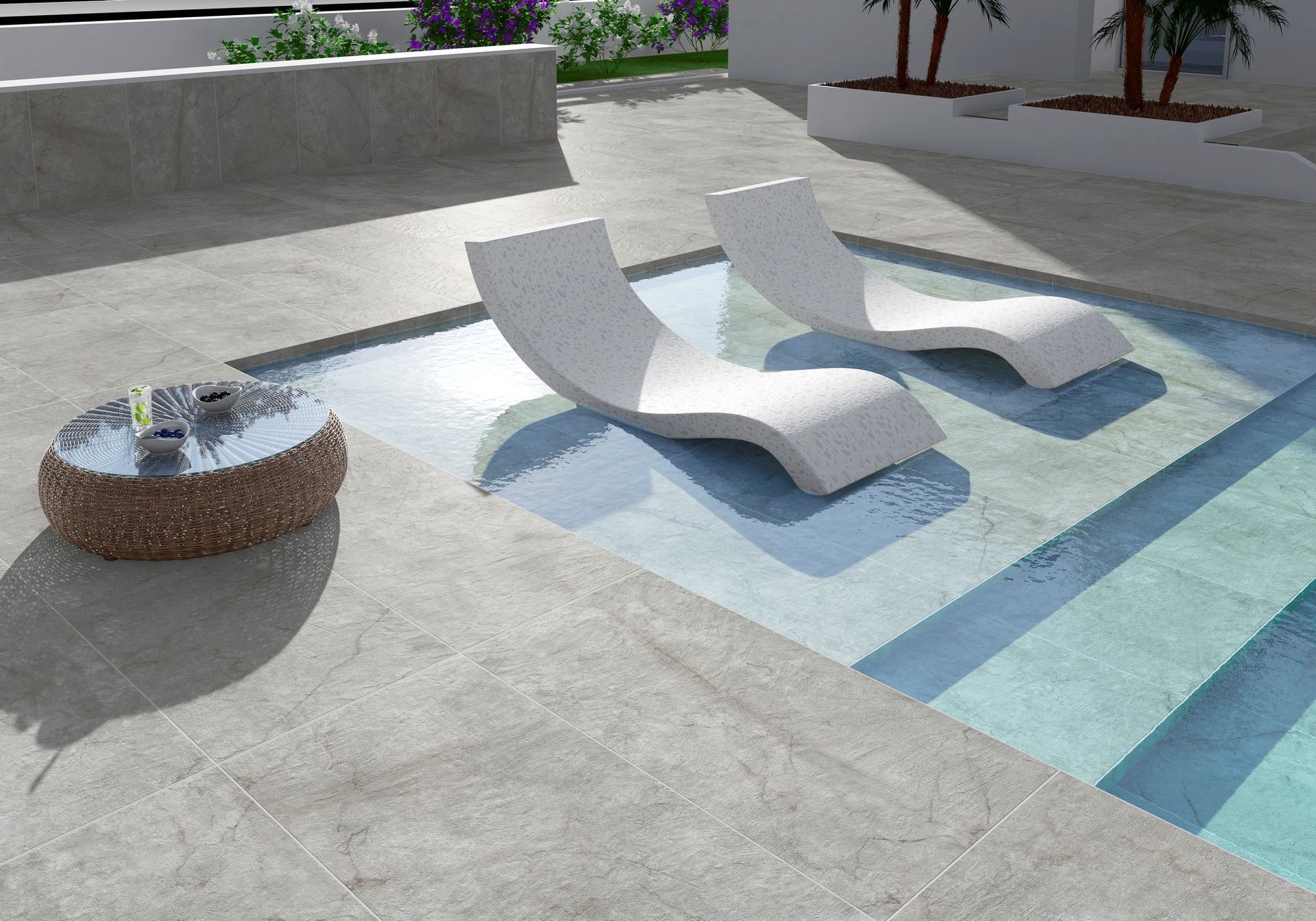 Patio moderno con due lettini bianchi accanto a una piscina poco profonda rivestita di piastrelle blu e a un braciere