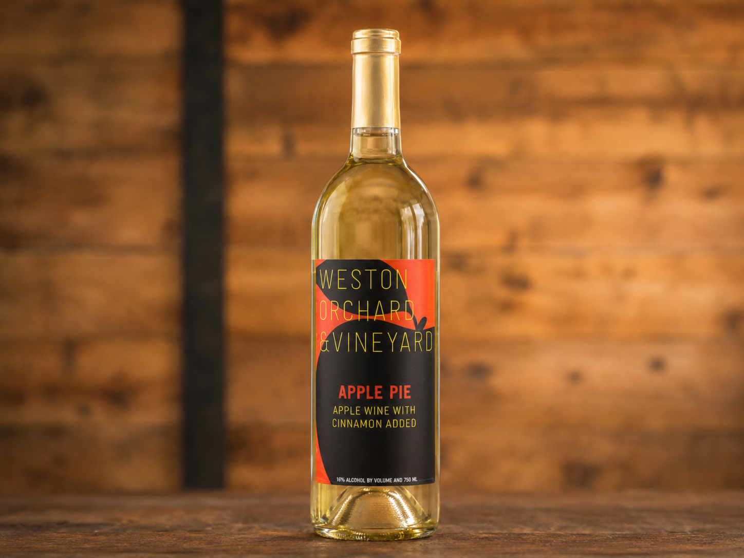 Three bottles of weston vineyard wine are on a table