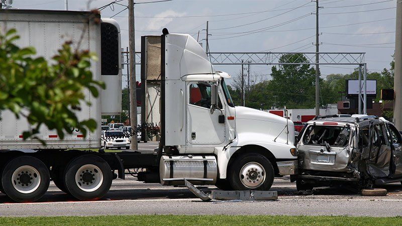 truck crashed into smaller car