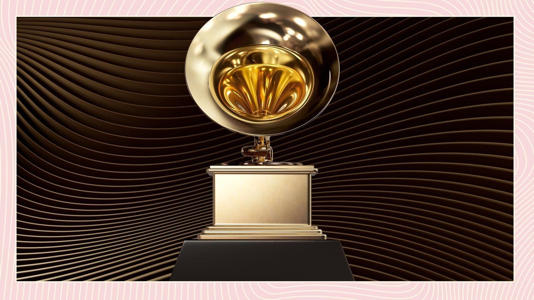 Gold trophy on a pedestal against a dark, wavy background