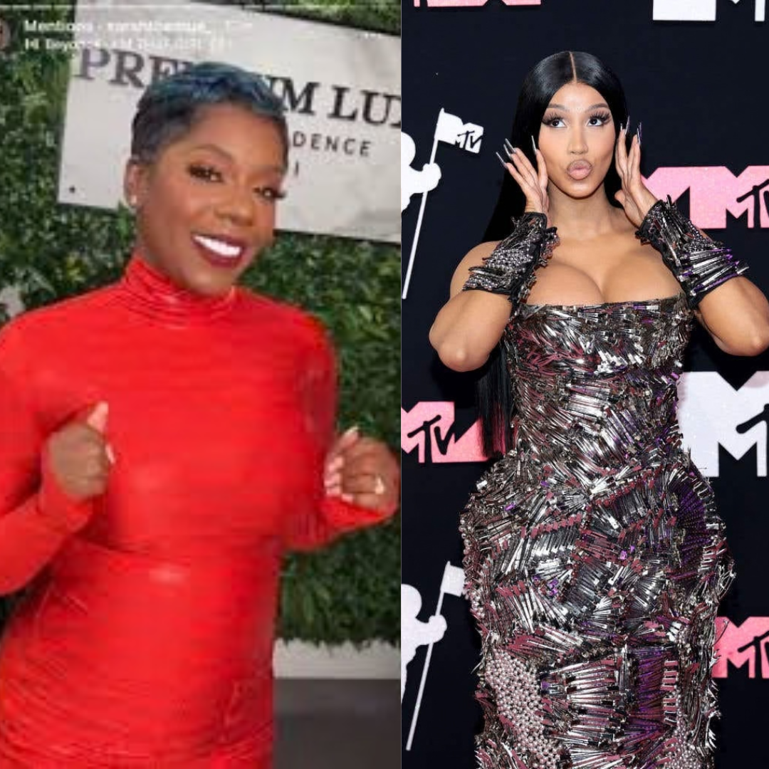 Two women posing at an event, one in a red dress and one in a metallic black dress.