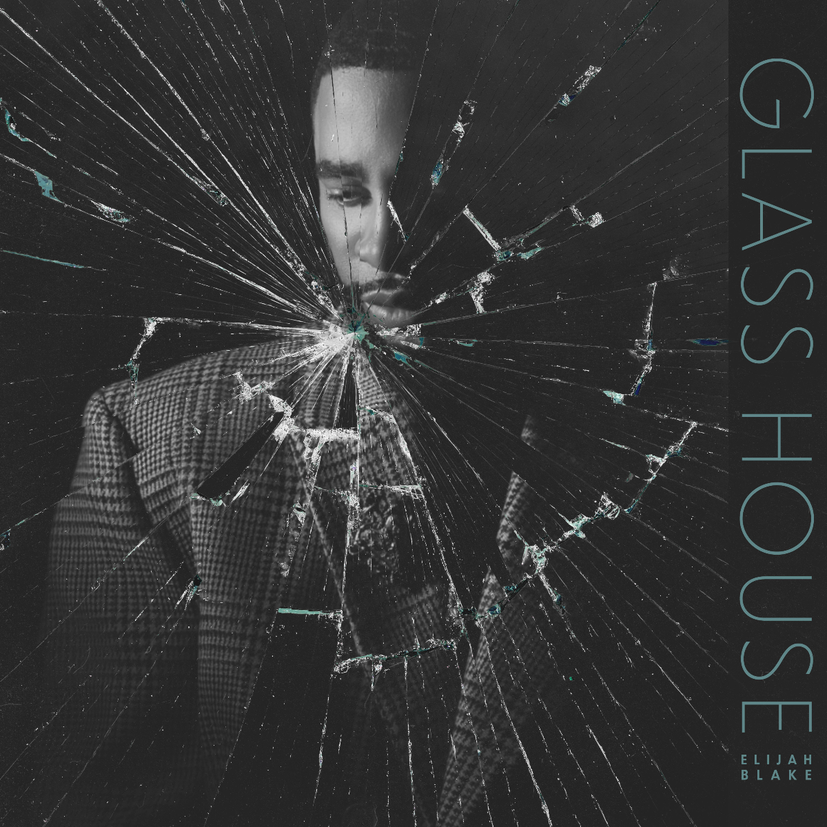 Shattered-glass album cover with a grayscale man in a suit and the title “GLASSHOUSE” on the right.