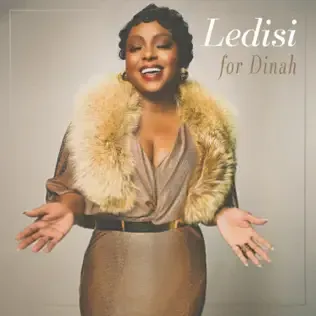 Album cover featuring a smiling woman in a beige dress and fur stole, with text “Ledisi for Dinah”