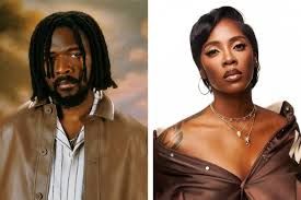 Two portrait photos side by side: a man in a tan jacket and a woman in a brown off-shoulder top on a white background