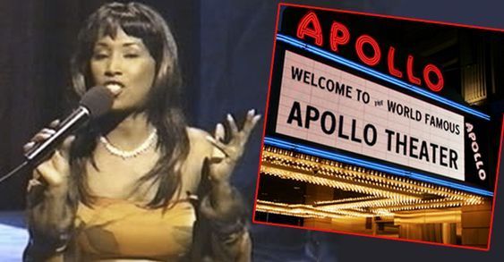 Singer performing at a microphone beside a photo of the Apollo Theater marquee