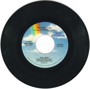 Black vinyl record label with “The Jets” and You Got It All text on a light blue center label