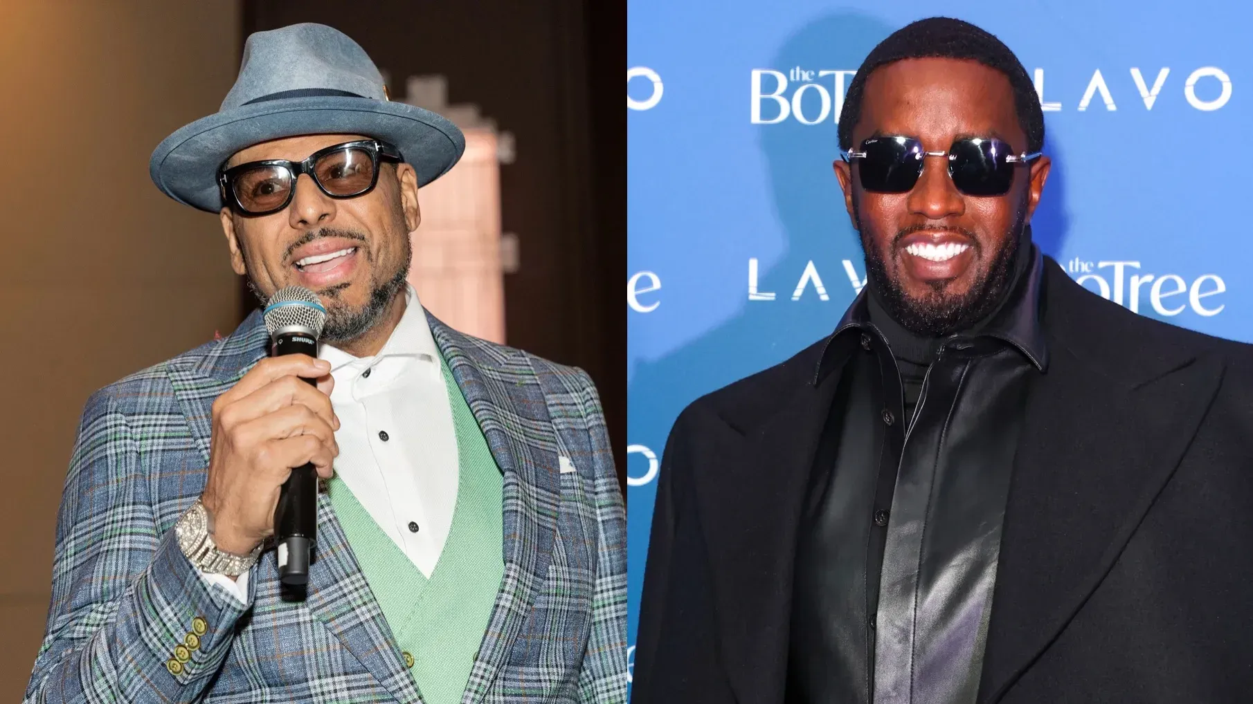 Two men in suits and sunglasses posing at a red carpet event, one holding a microphone.