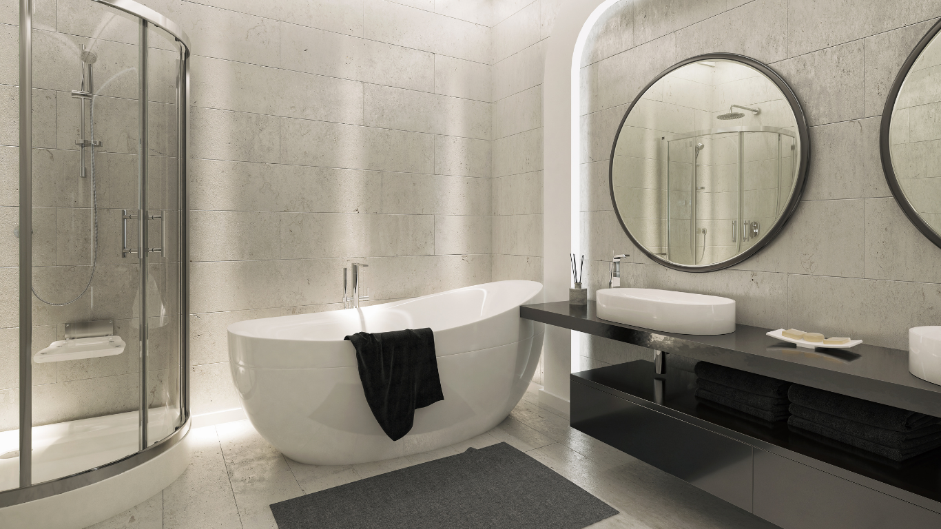 Modern bathroom with a freestanding white bathtub, a glass shower, and a black vanity with circular mirrors.