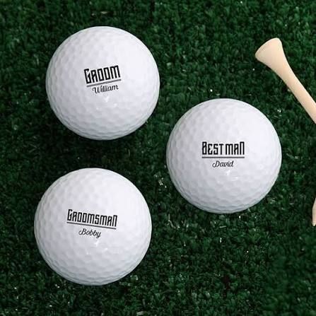 Three golf balls on green turf labeled Grandmom, Best Mom, and Grandmom, with a tee nearby.