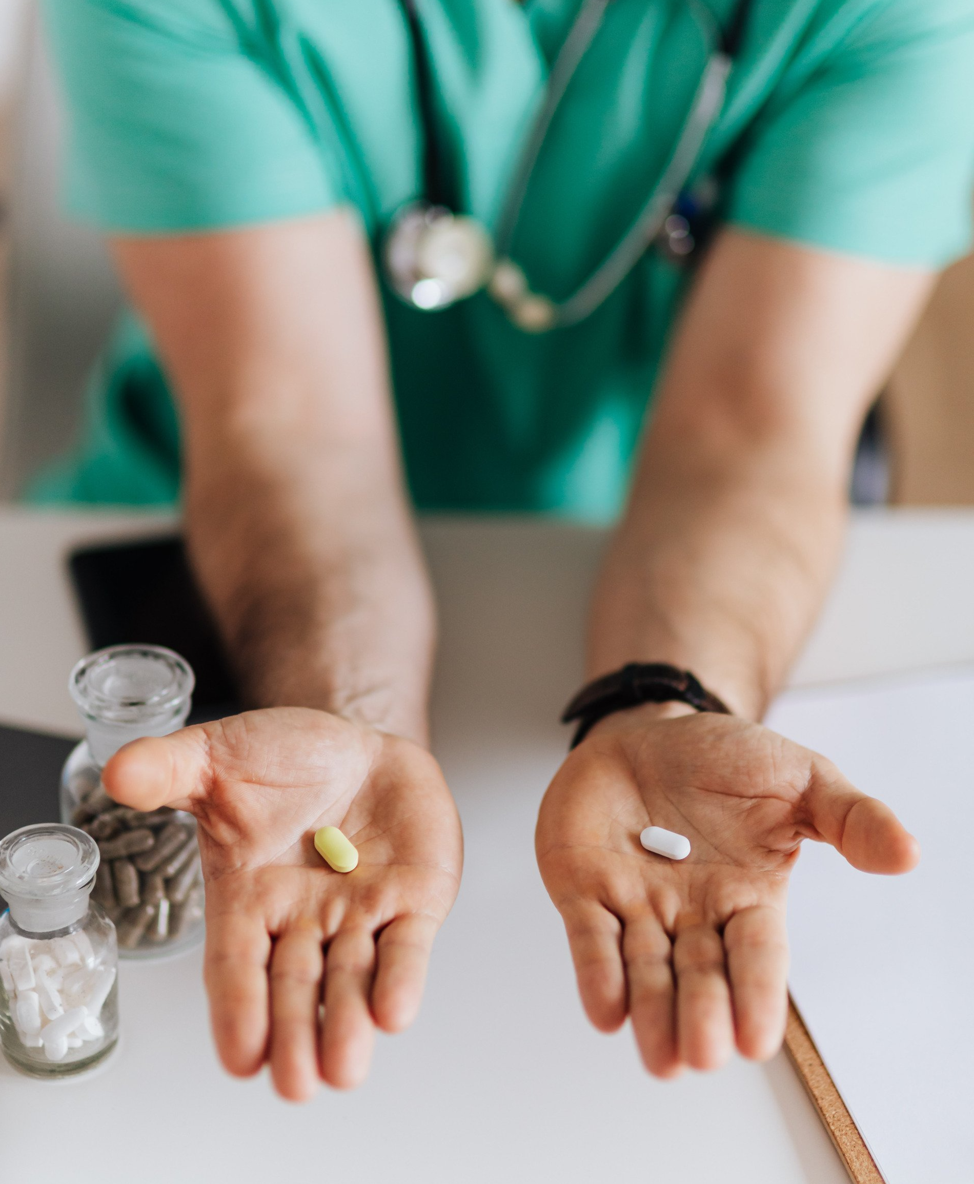 doctor arms hands pills