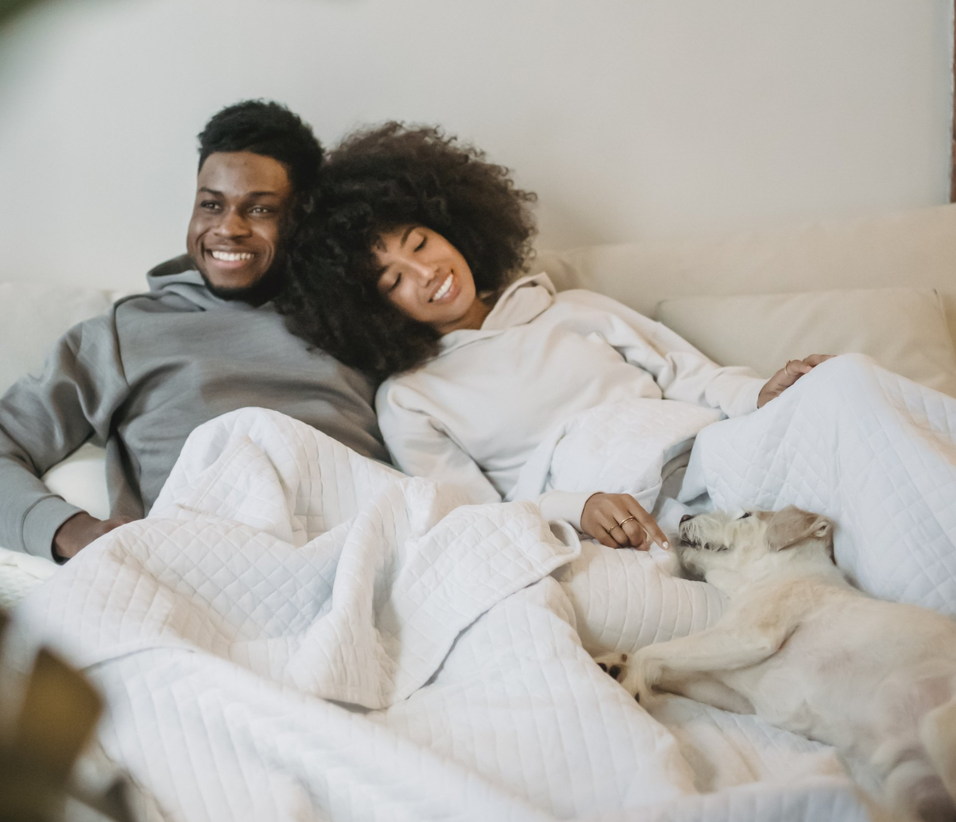 African American man woman dog resting
