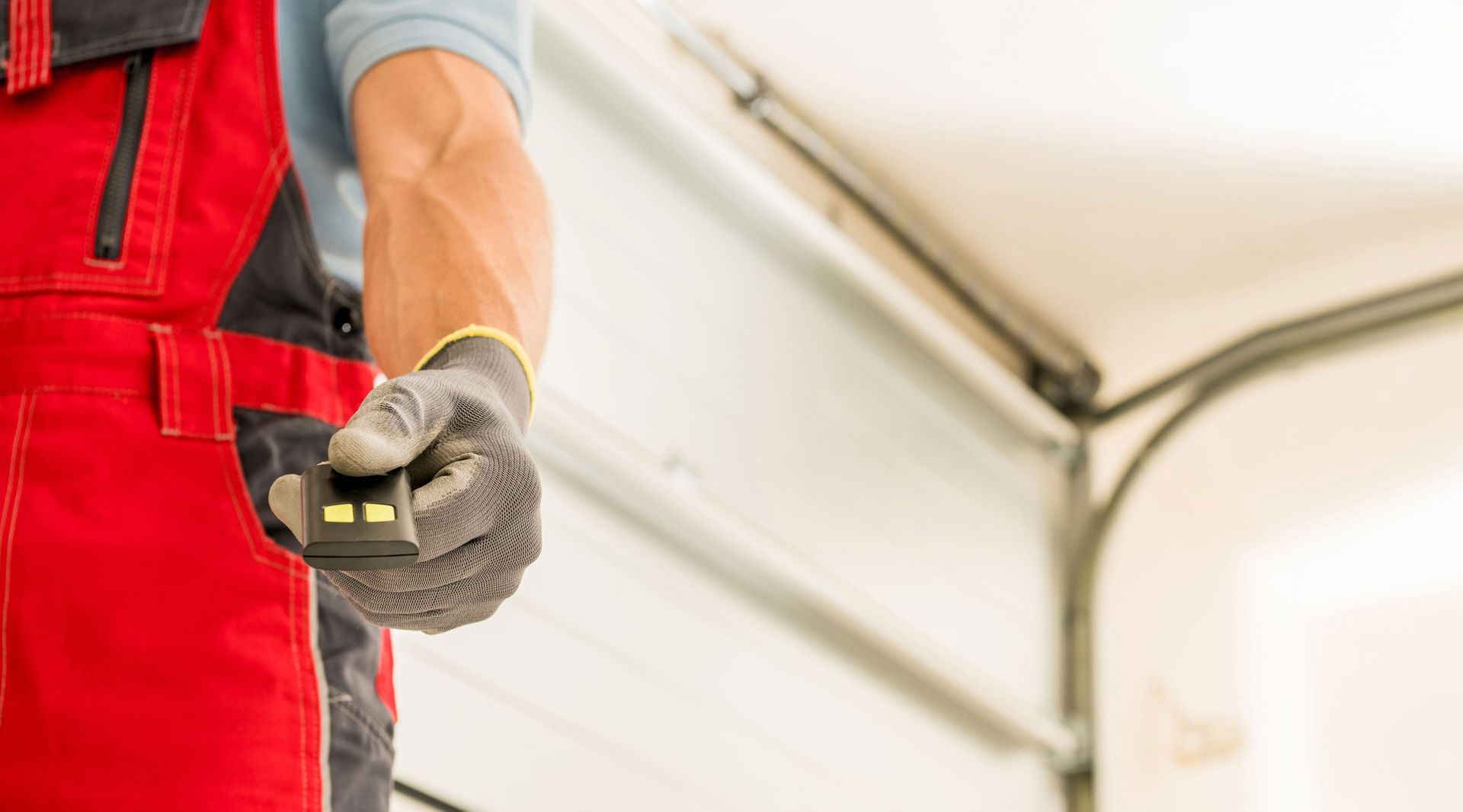 Worker Using Garage Door Remote — Rockland County — A+ Garage Door Service