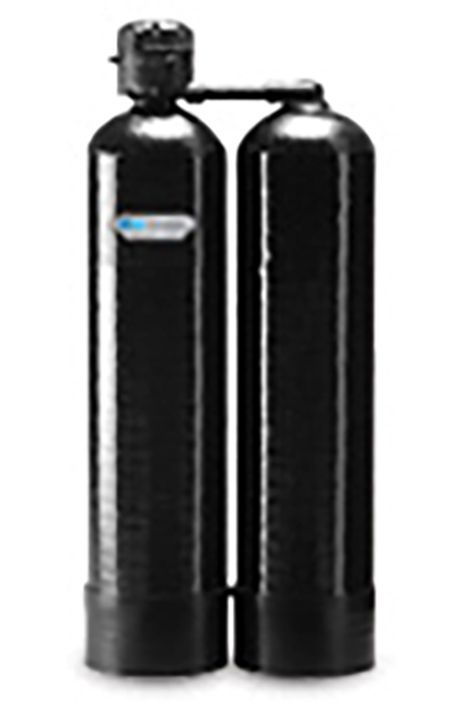 Two tall black water softener tanks connected at the top, standing side by side.