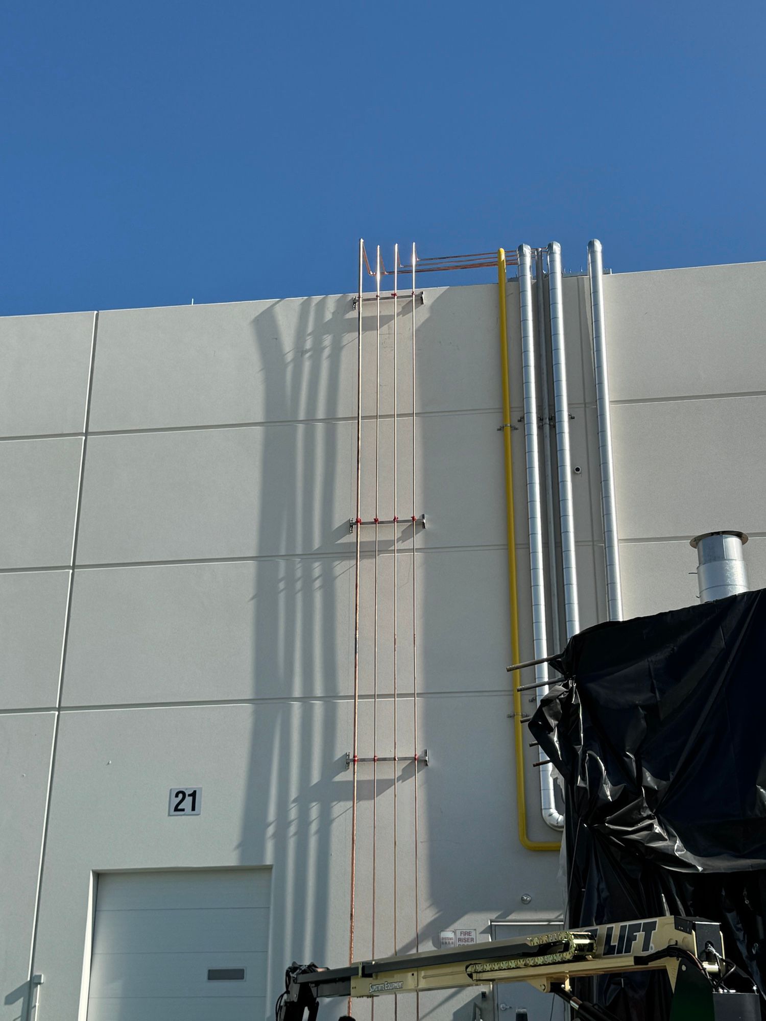 A white building with the number 21 on it