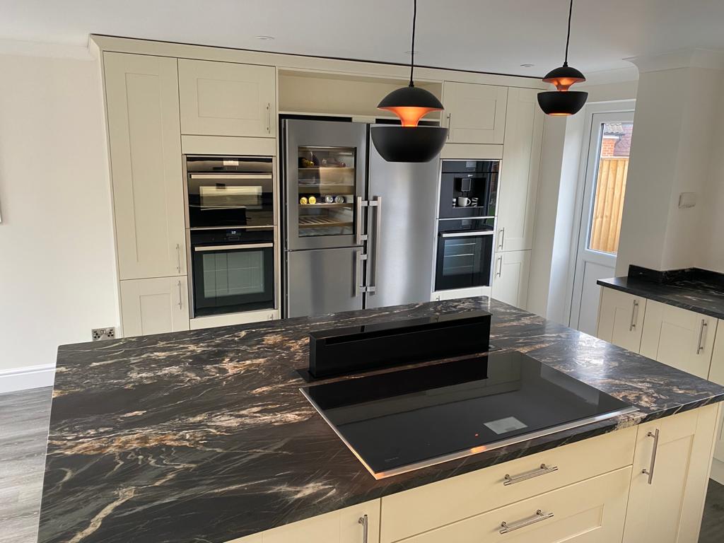 Traditional cream kitchen with large granite top island