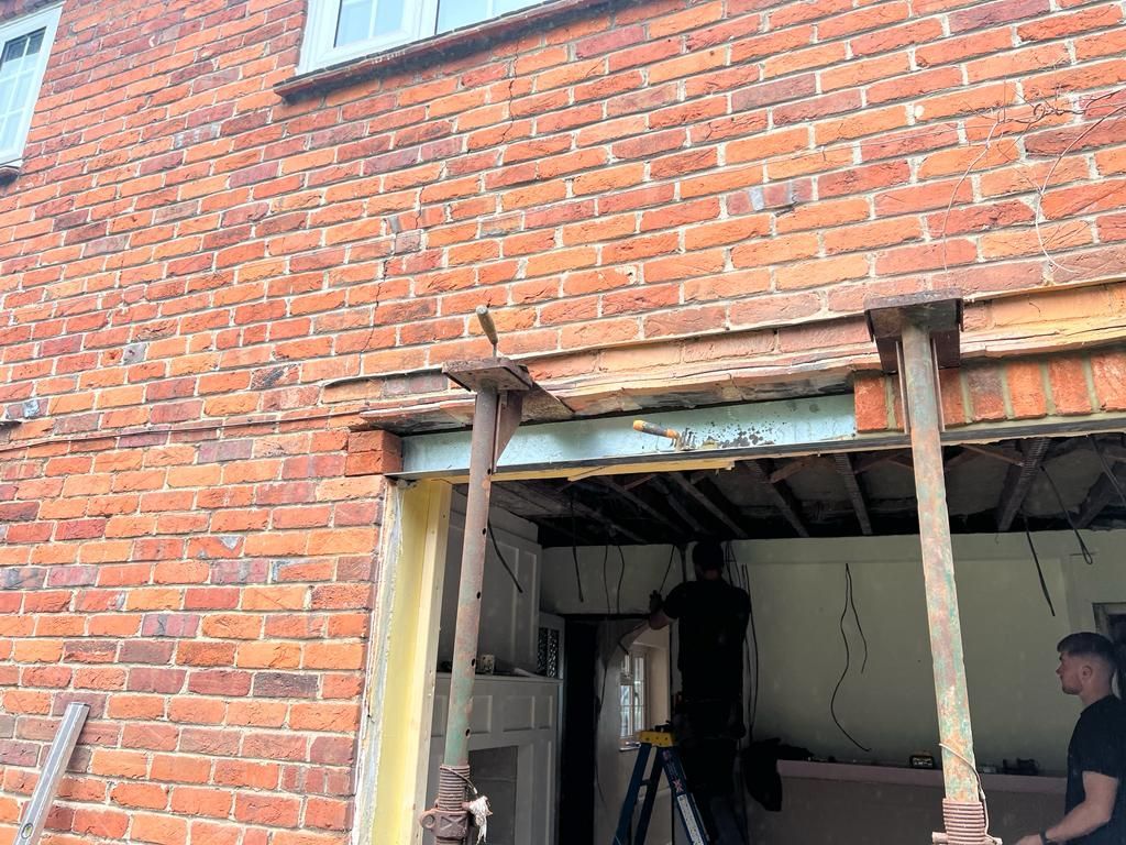 Props holding up door opening