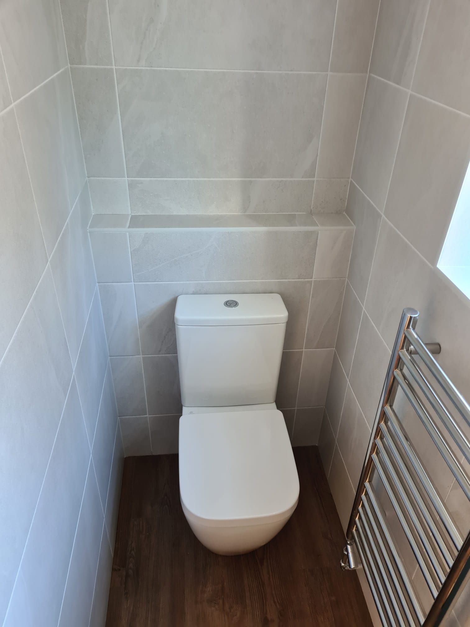 Modern bathroom with grey tiles