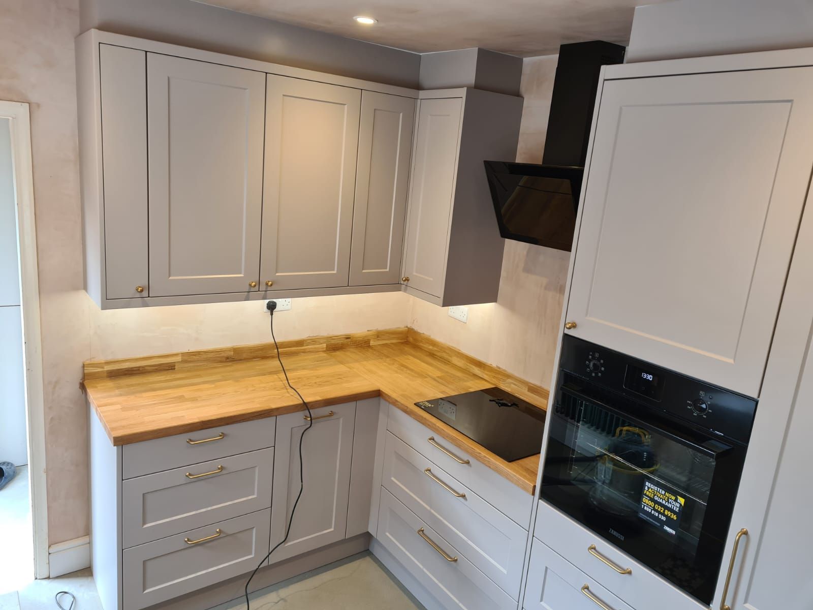 traditional cream kitchen with wood block worktops