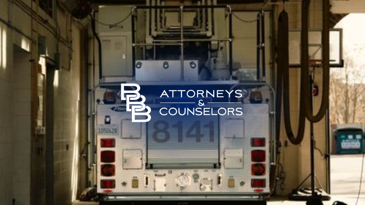 Attorney’s & Counselors logo on a blue sign inside a hallway or lobby entrance