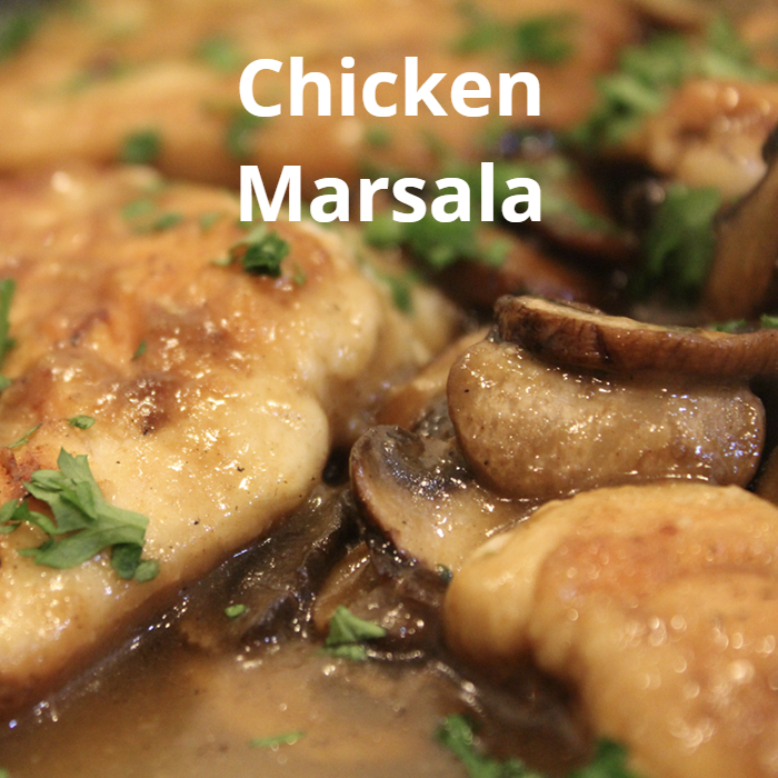 Tender chicken breasts dredged in seasoned flour and pan-fried to golden brown perfection, topped with sautéed mushrooms and a rich Marsala wine sauce, garnished with fresh parsley.