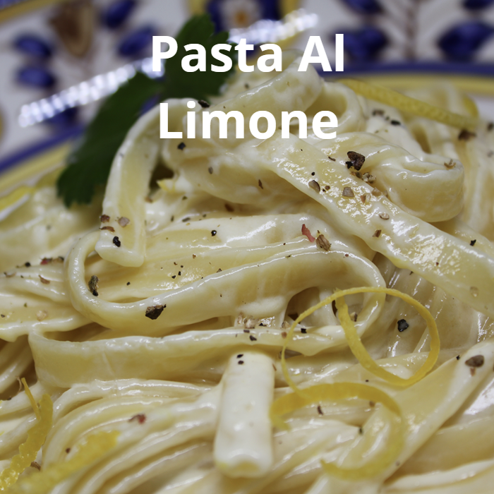 A delightful plate of Pasta al Limone, featuring fettuccine pasta tossed with a creamy lemon sauce made from heavy cream, lemon zest, Parmesan cheese, and lemon juice, garnished with freshly ground black pepper.