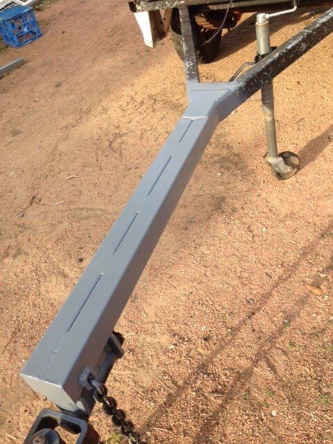 A Piece Of Metal With A Chain Attached To It — Bohle Welding & Trailer Repairs In Bohle, QLD