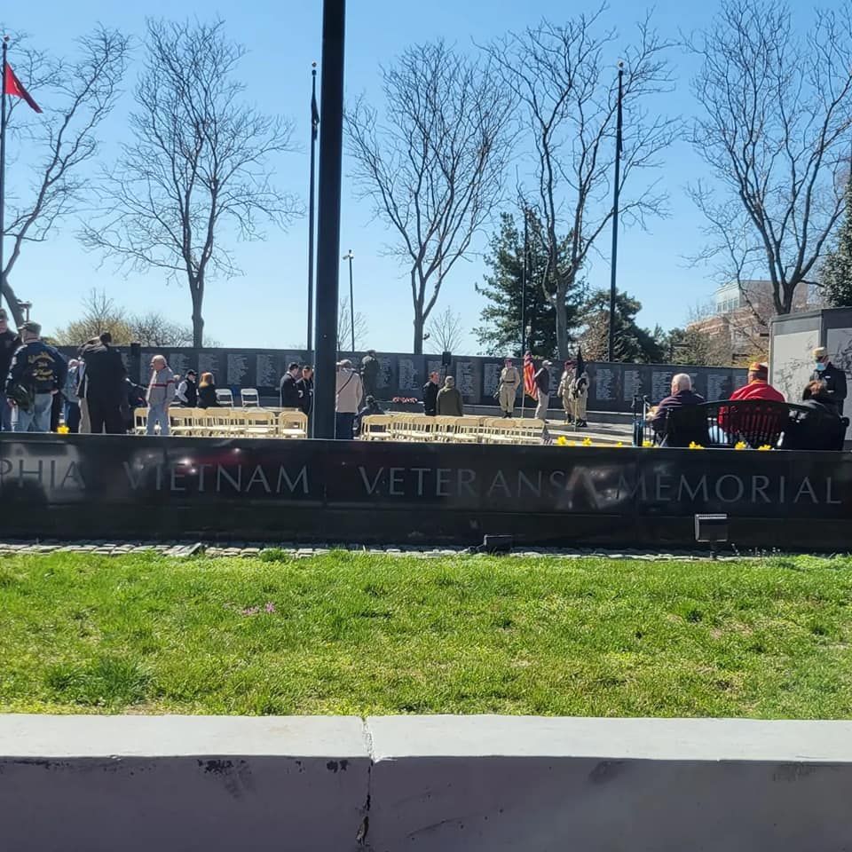 Vietnam veterans memorial with people standing in front of it
