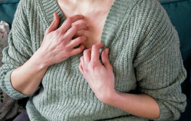 A Woman In A Green Sweater — Pittsburgh, PA — South Hills Dermatology, PC