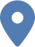 Blue location pin icon with a white center circle