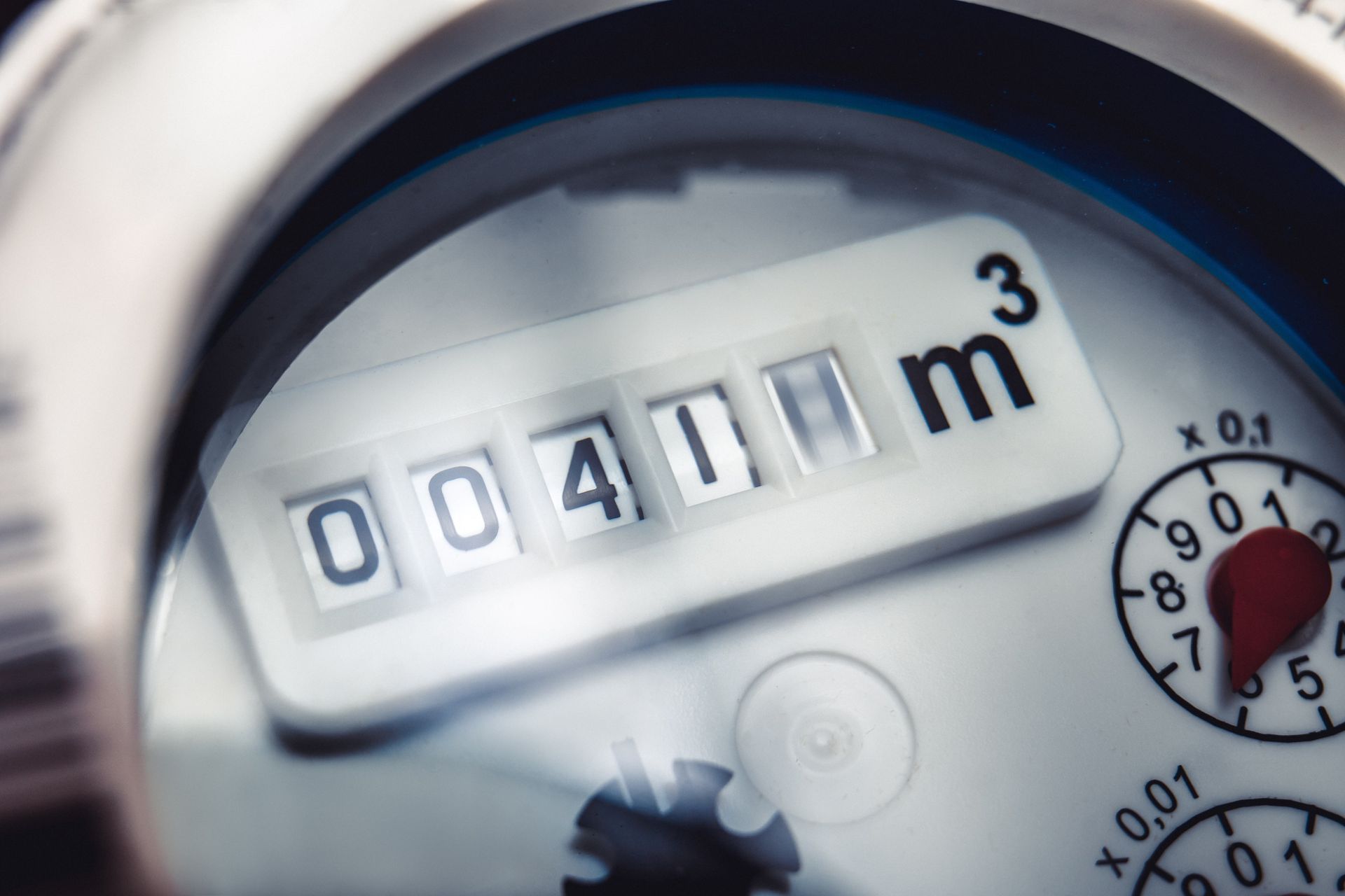Homeowner turning off water meter during plumbing emergency