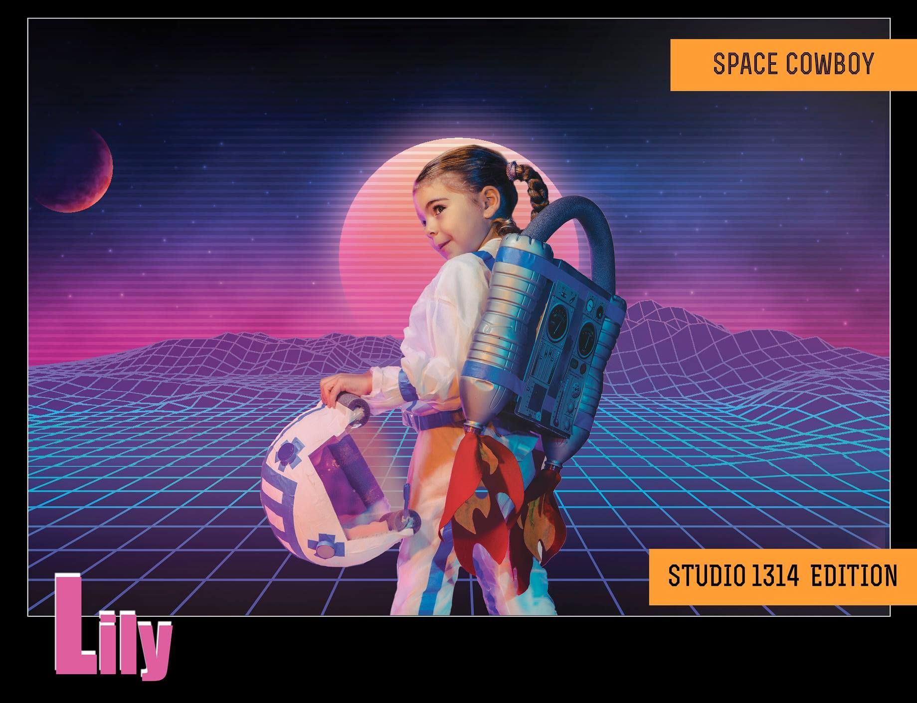 A little girl is wearing an astronaut outfit and holding a space helmet
