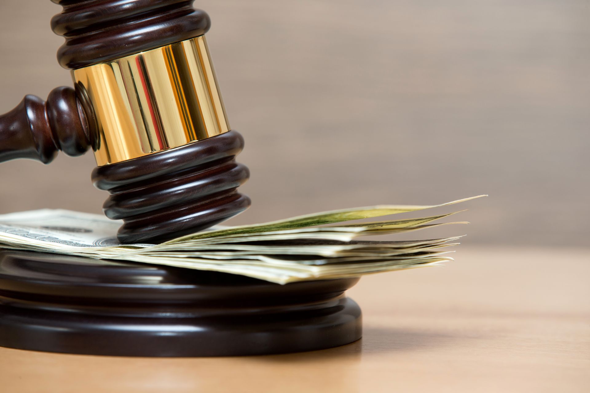 gavel on a stack of money