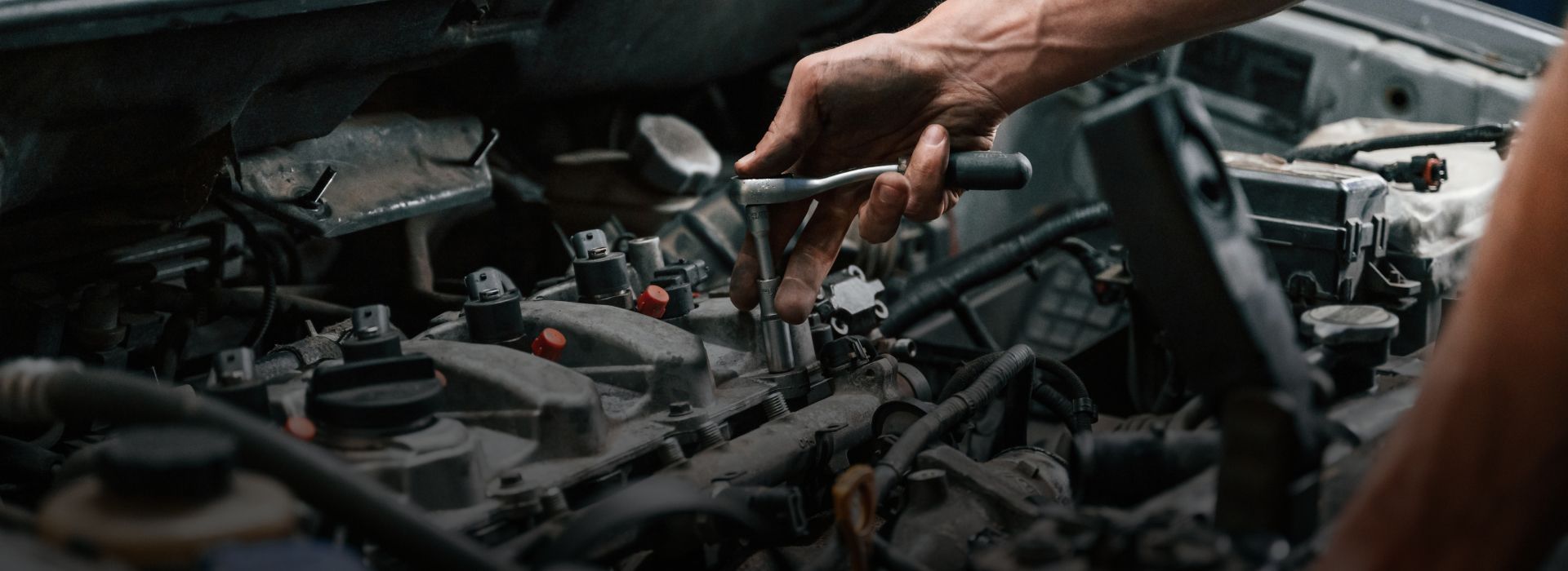 Men Repairing the Car |  Strickland Automotive Repair Inc.