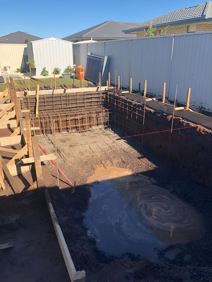 A Swimming Pool is Being Built in the Backyard of a House — Limited Access Excavation In Ballina, NSW
