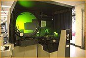 Large Optical Comparator Used in Making Progressive Dies - Coil Stamping Inc.