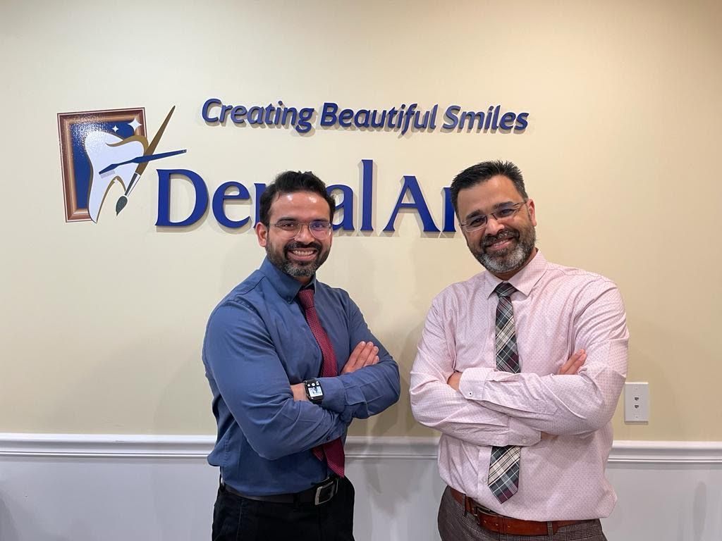 two doctors are standing next to each other 