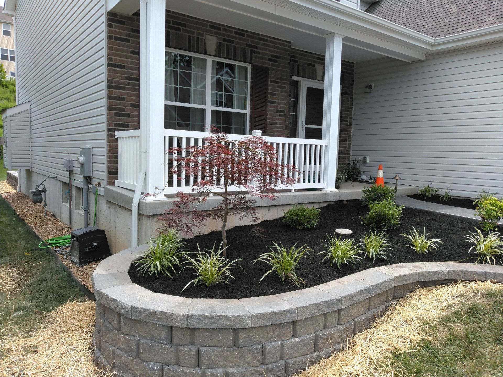 Outside Patio With Plants — Arnold, MO — Red Oak Landscaping
