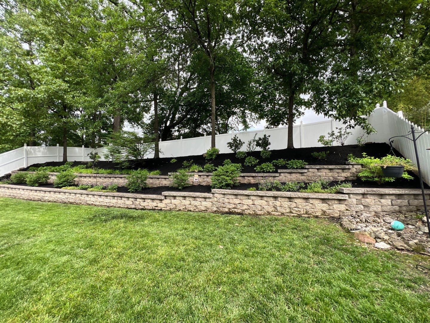 Beautiful Block Wall With Plants — Arnold, MO — Red Oak Landscaping