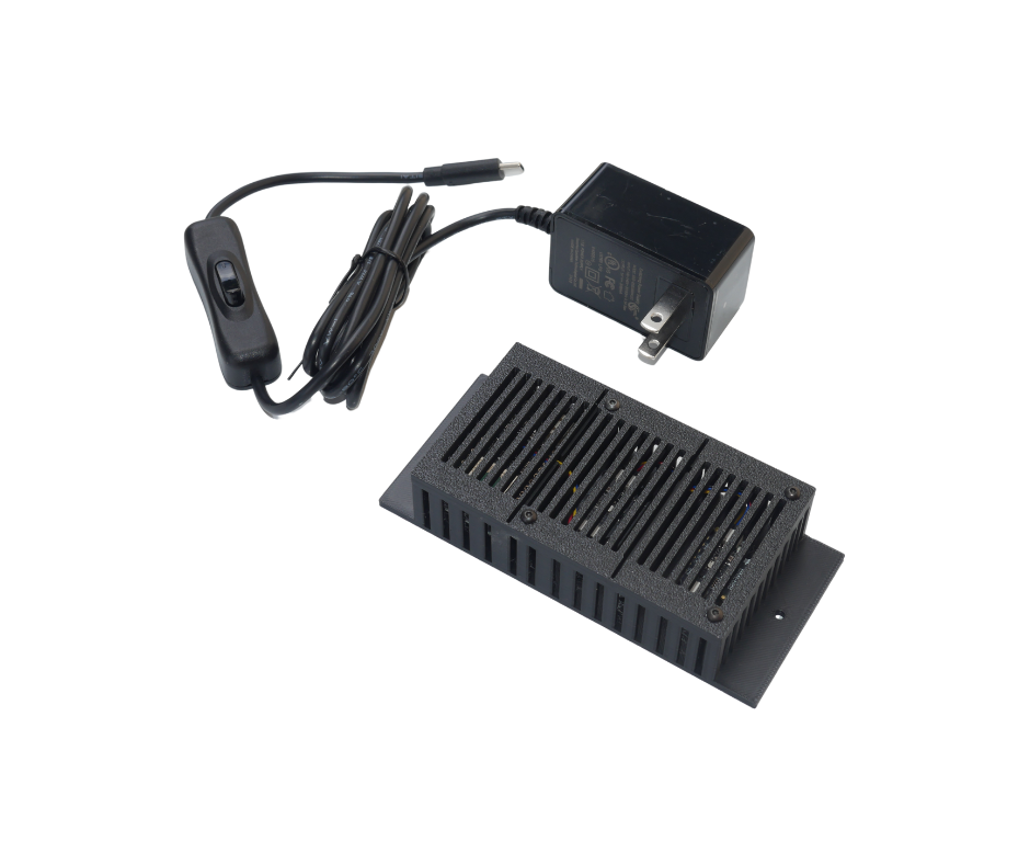 An AirGuard device with a power supply with a cord attached to it.