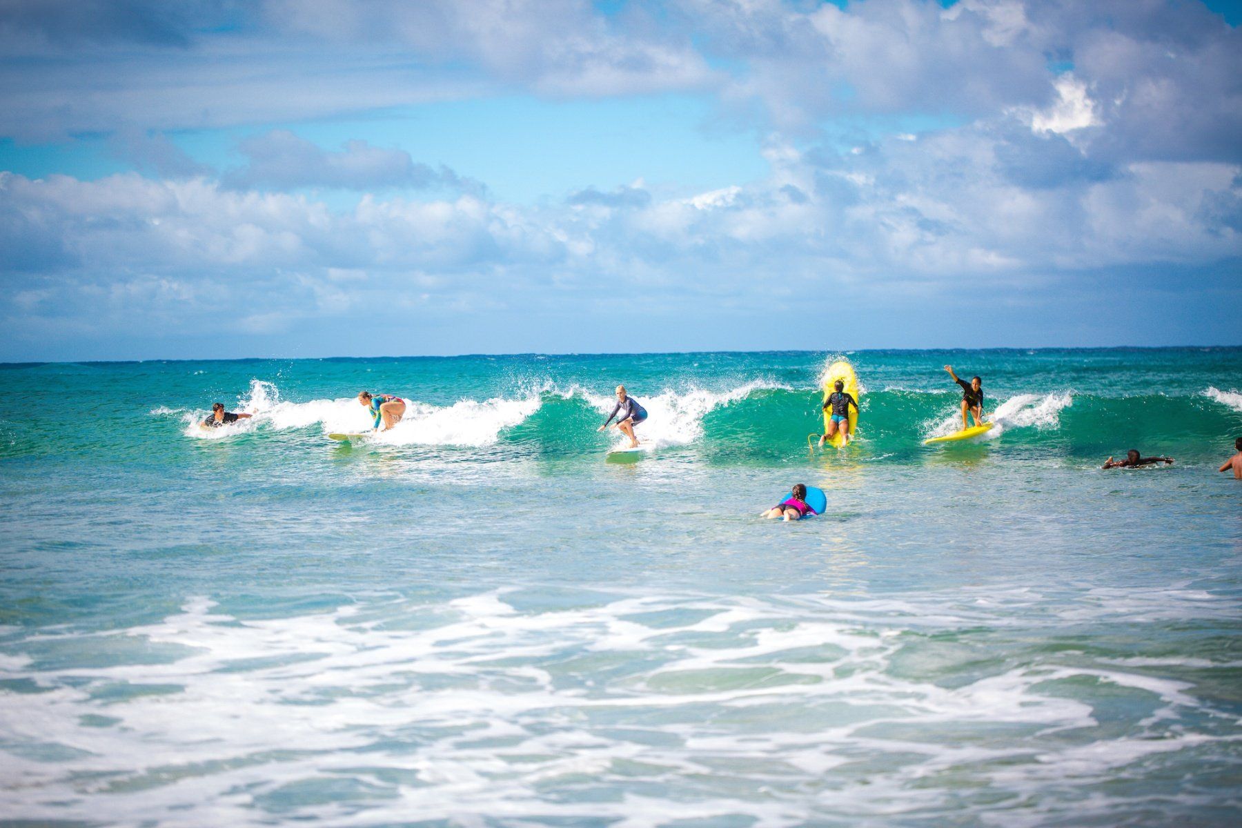 People surfing at Tofo
