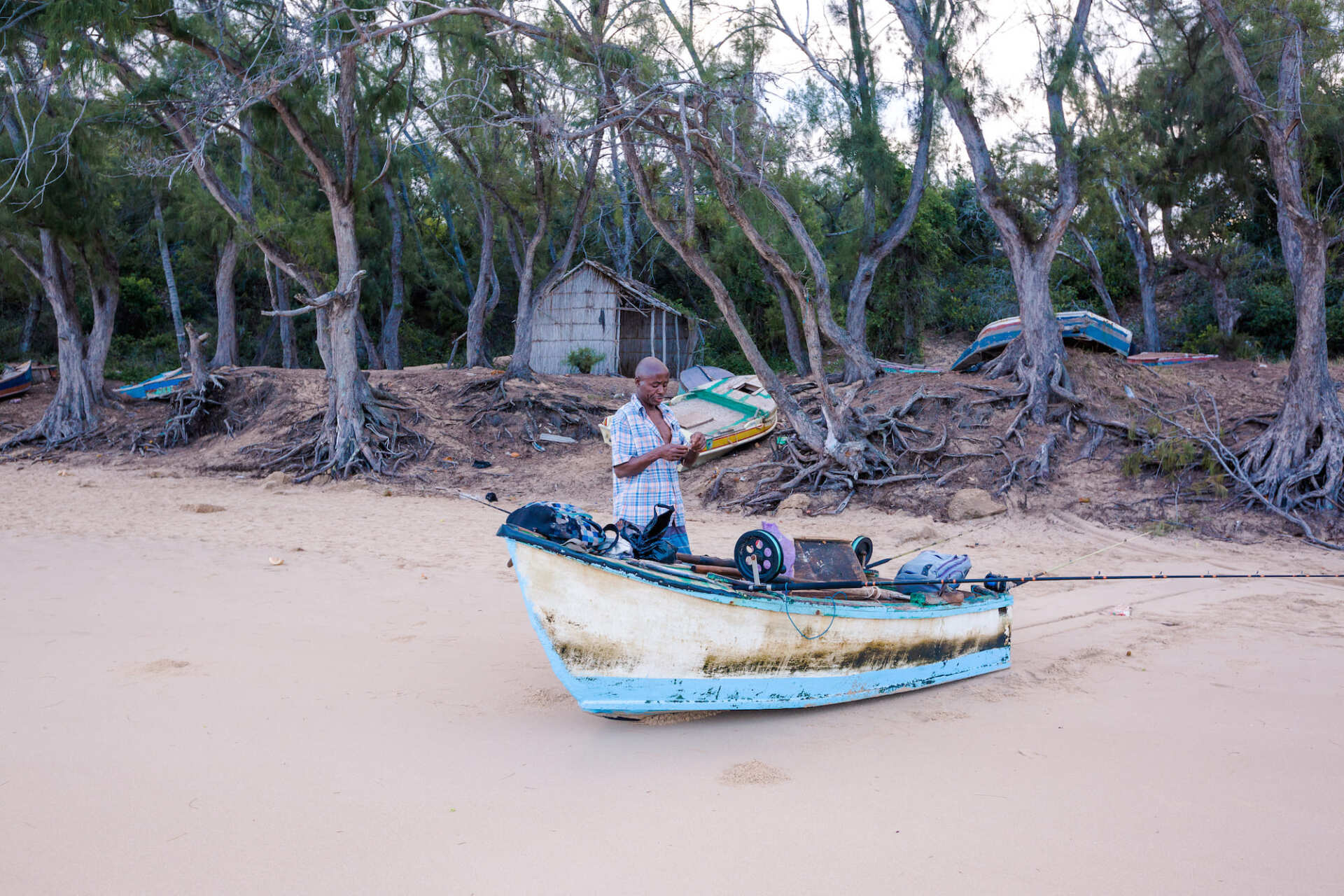 Fisherman at his boat on Tofo Beach